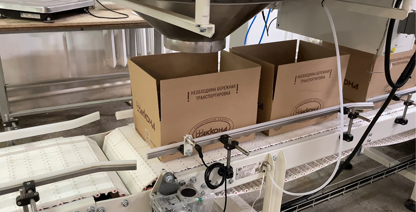 Участок автоматической фасовки конфет в гофрокороба